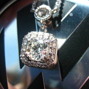 LTP's .46 ct. OEC pendant with bezel set .20 ct. OMC