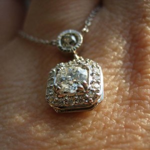 LTP's .46 ct. OEC pendant with bezel set .20 ct. OMC