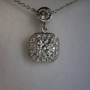 LTP's .46 ct. OEC pendant with bezel set .20 ct. OMC