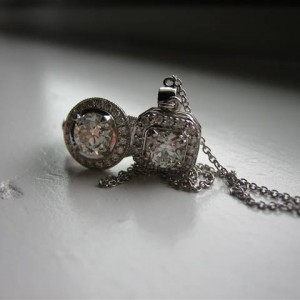 LTP's .46 ct. OEC pendant with bezel set .20 ct. OMC