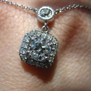 LTP's .46 ct. OEC pendant with bezel set .20 ct. OMC