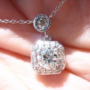 LTP's .46 ct. OEC pendant with bezel set .20 ct. OMC