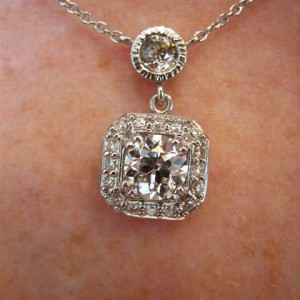 LTP's .46 ct. OEC pendant with bezel set .20 ct. OMC