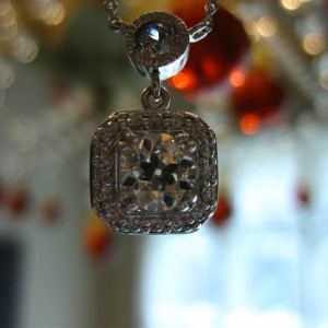 LTP's .46 ct. OEC pendant with bezel set .20 ct. OMC