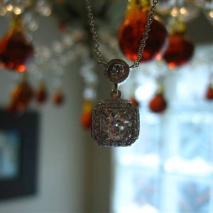 LTP's .46 ct. OEC pendant with bezel set .20 ct. OMC