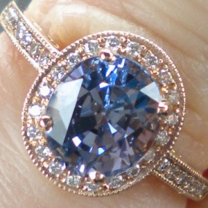 2.8 carat Tanzanian periwinkle blue spinel in 18K rose gold and diamond halo.