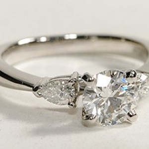 Classic Pear Shaped Diamond Engagement Ring with Round cut Diamond