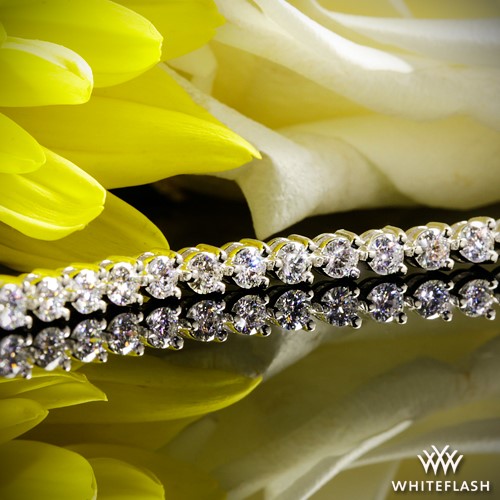 38 stunning A CUT ABOVE® Diamond Melee set in Three-Prong Diamond Tennis Bracelet