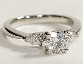 Classic Pear Shaped Diamond Engagement Ring with Round cut Diamond