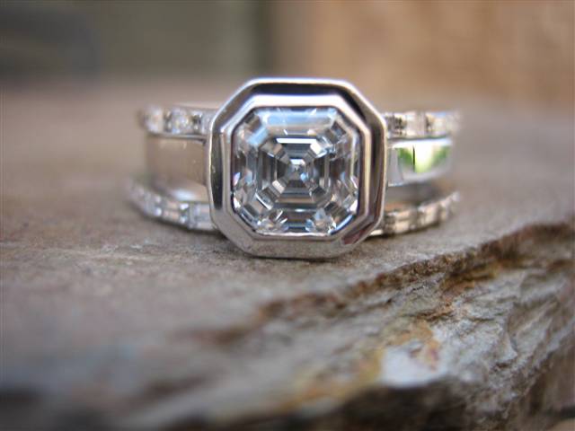 LaurenThePartier's 3 ring Asscher set