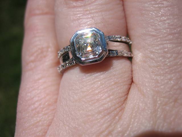 LaurenThePartier's 3 ring Asscher set