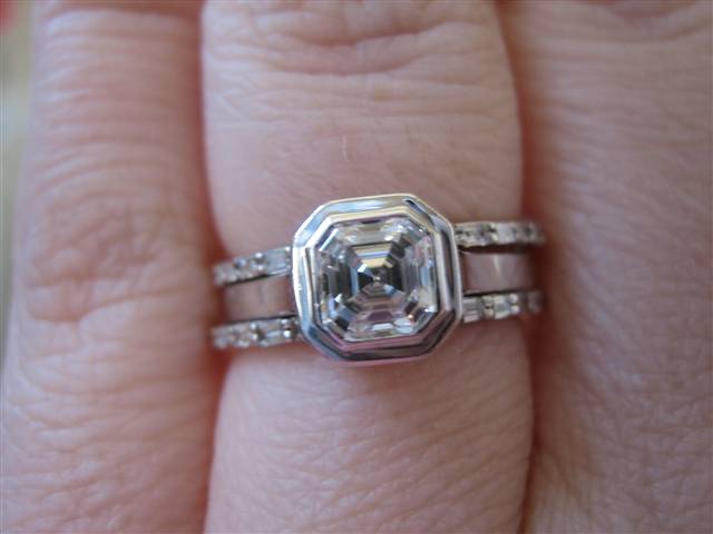 LaurenThePartier's 3 ring Asscher set