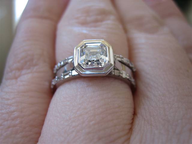 LaurenThePartier's 3 ring Asscher set