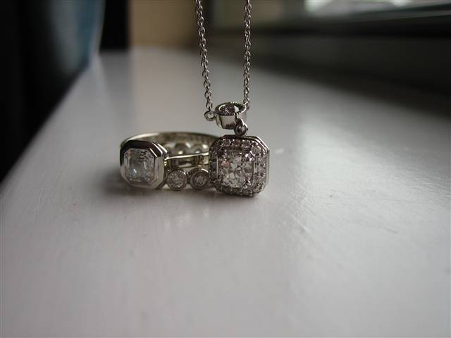 LTP's .46 ct. OEC pendant with bezel set .20 ct. OMC