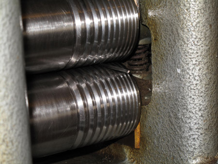 Platinum wire between rollers of a mill