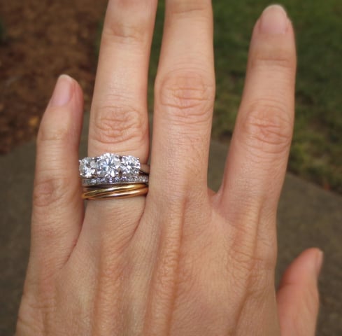 Three-stone diamond ring with Cartier Trinity