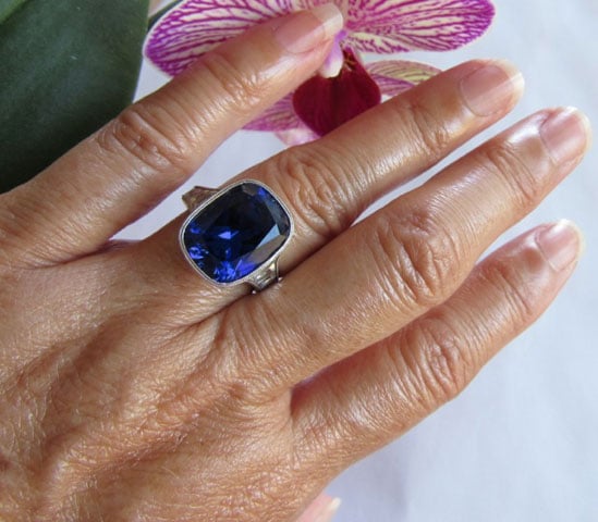 makeable's 9 Carat Cushion Cut Tanzanite Ring with Vintage Tapered French Cut Diamonds (Hand View) - image by makeable makeable's 9 Carat Cushion Cut Tanzanite Ring with Vintage Tapered French Cut Diamonds (Hand View) - image by makeable
