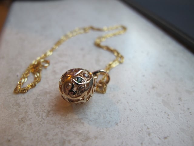 Gold and Sapphire Egg Pendant by Heart of Water Jewels - Image by mochiko42