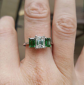 LawmaLlama's Three Stone Emerald Cut Diamond and Tsavorite Ring  (Hand View) - image by LawmaLlama