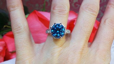 Rothschild55's Antique Cut Round Electric Blue Topaz Ring (Hand View) - image by David Klass