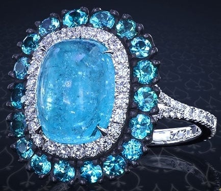 doberman's Split Shank Oval Paraiba Tourmaline Cabochon Ring (Top Angled View) - image by Leon Megé doberman's Split Shank Oval Paraiba Tourmaline Cabochon Ring (Top Angled View) - image by Leon Megé