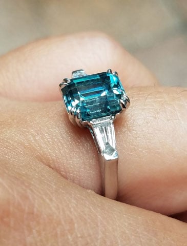 mochiko42’s 3 Stone Emerald Cut Blue Zircon Ring (Side View) - image from mochiko42