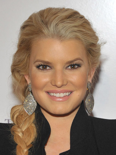 Jessica Simpson wearing diamond earrings from Bavna