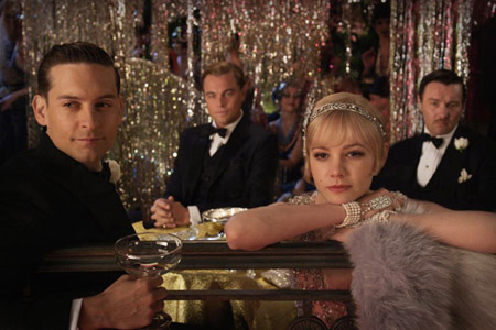 Leonardo-DiCaprio, Tobey Maguire, Joel-Edgerton, and Carey-Mulligan in a still from The Great Gatsby