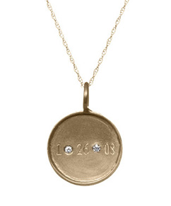 Date and diamonds disc necklace by Golden Thread