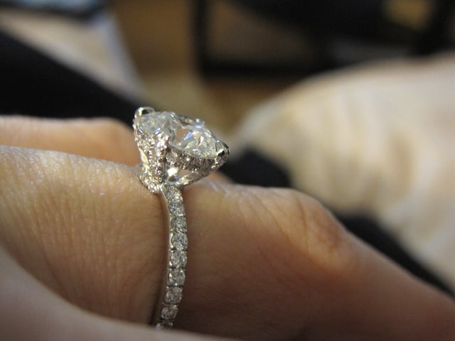 Pave diamond solitaire engagement ring