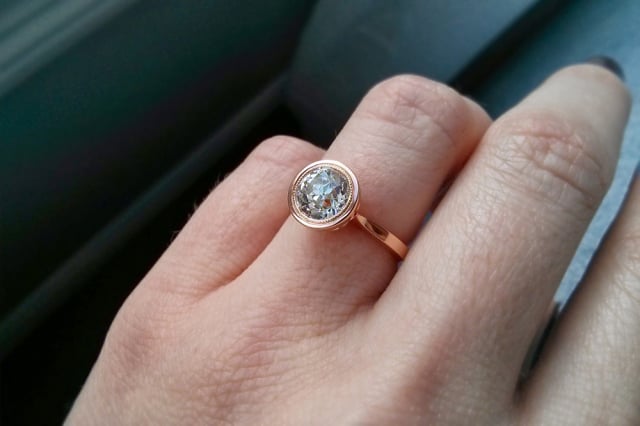 Bezel engagement ring in rose gold with old European cut diamond