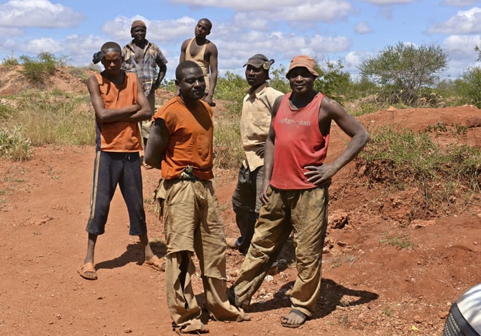 Gemstone miners take a moment to pose for a still from Sharing the Rough. 