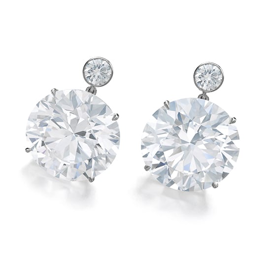 A pair of D-color, internally-flawless diamonds weighing 23.77 and 23.78 carats