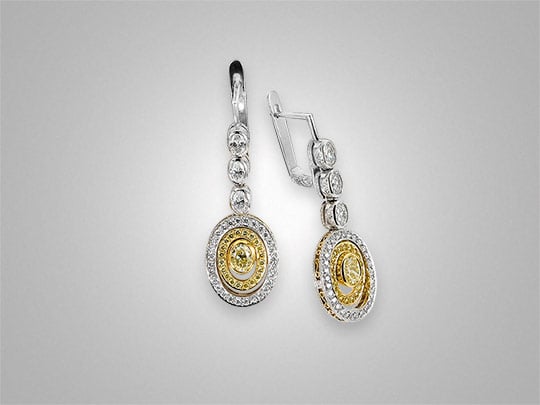 Victor Canera fancy yellow oval diamond earrings