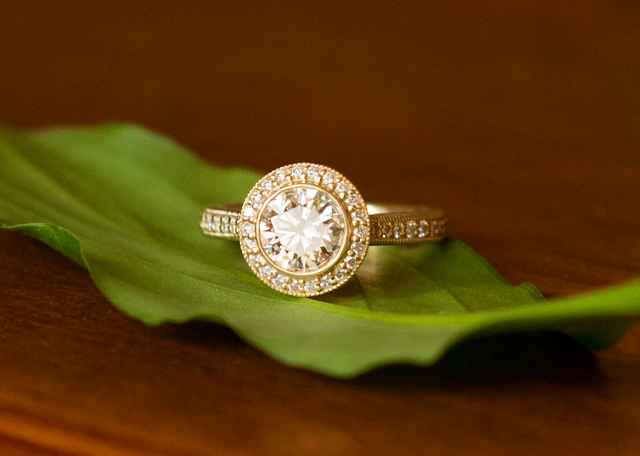 Yellow gold diamond halo engagement ring Yellow gold diamond halo engagement ring