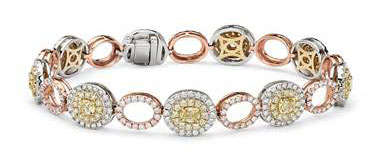 Yellow and White Diamond Oval Halo Bracelet in 18k White, Rose and Yellow Gold at Blue Nile