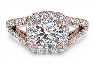 Cushion diamond set in a rose gold halo setting