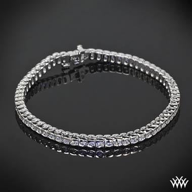 Half bezel diamond tennis bracelet with a 42 Cut Above diamond melee at Whiteflash