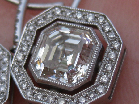 Asscher cut diamond halo earrings with millegrain