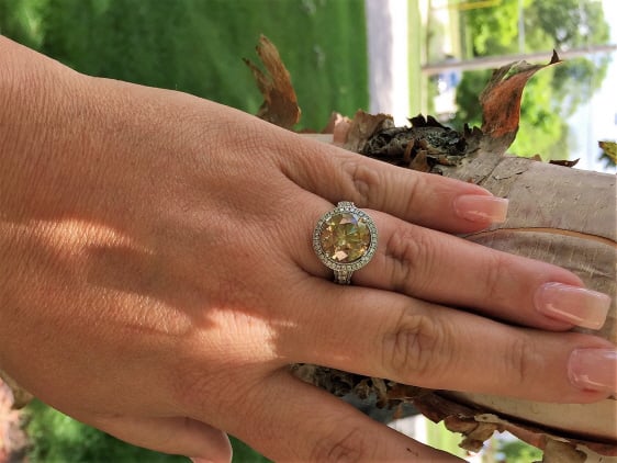 Blingmeupscotty's fancy dark champagne diamond engagement ring in a new halo setting hand shot