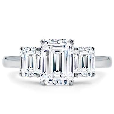 Emerald cut three stone engagement ring at Adiamor