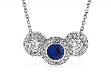 Sapphire and diamond pendant set in platinum