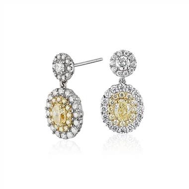 Fancy yellow diamond halo drop earrings in 18K white and yellow gold at Blue Nile