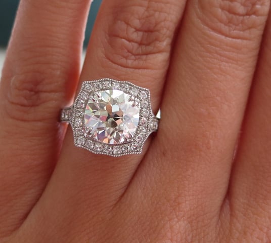 Halo diamond engagement ring shared by star sparkle