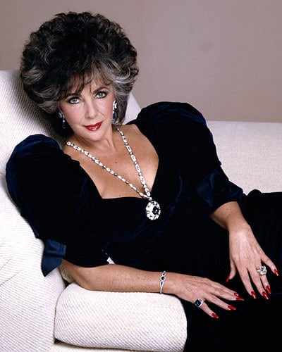 Elizabeth Taylor wearing the Bulgari Sapphire Sautoir and Trombino Ring 