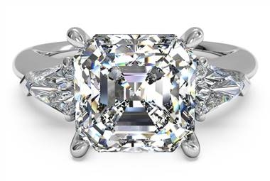 Three-stone engagement ring with bullet side diamonds set in platinum at Ritani 