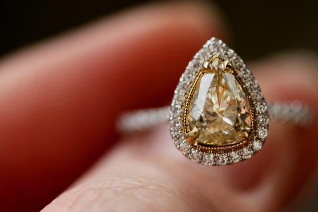 Fancy Light Yellow Diamond Halo Ring