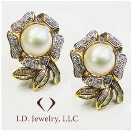 Baguette and round cut flower shape pearl earrings set in 18K yellow gold