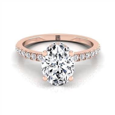 Classic petite split prong oval diamond engagement ring set in 14K rose gold at RockHer  