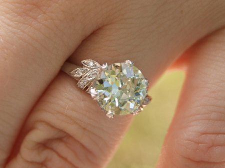 vintage style diamond ring on the hand